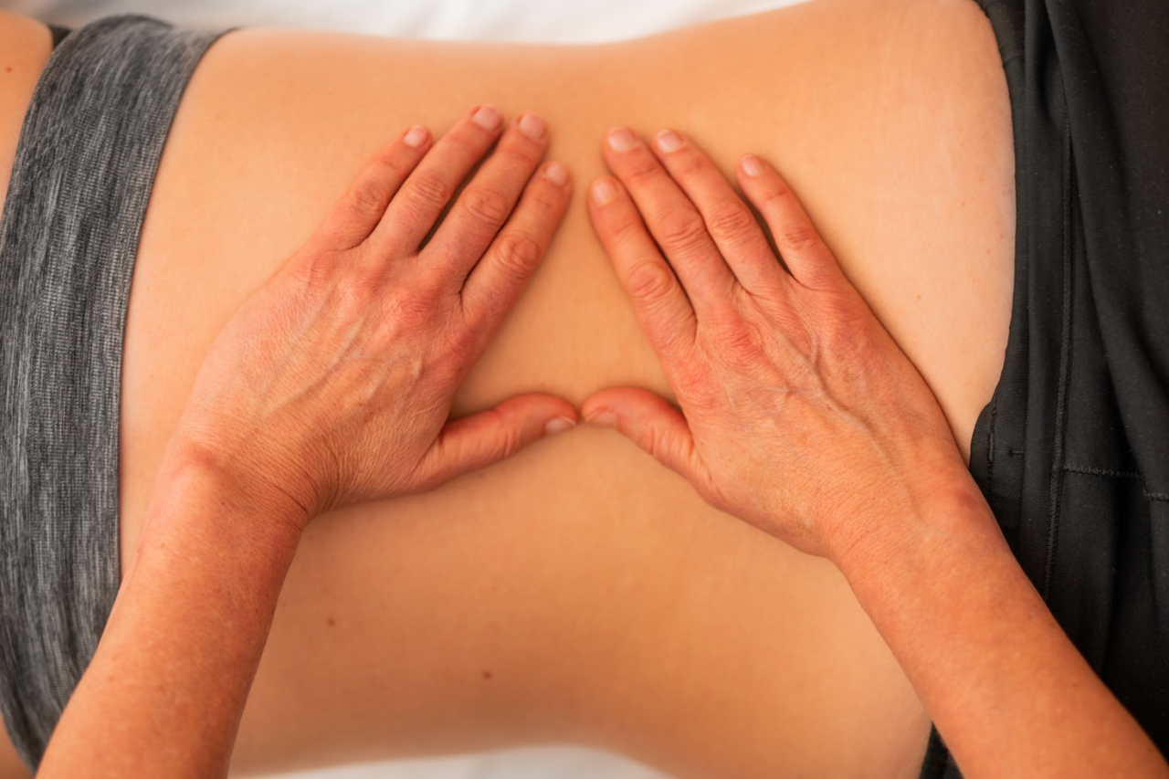 A chiropractor performing spinal manipulation